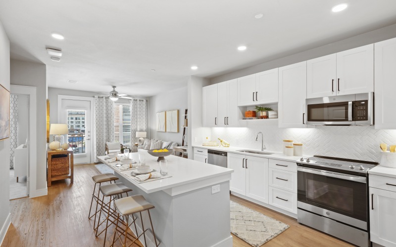 Spacious open floor plan with stainless steel appliances